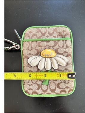 Coach Brown Monogram Wristlet with Green Trim and White Daisy Applique